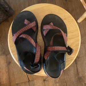 Black and red chacos